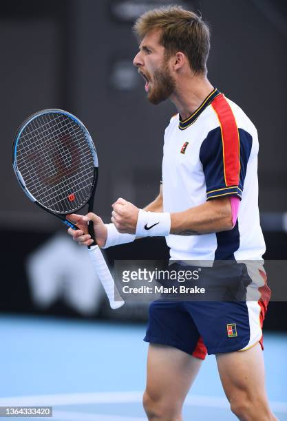 Corentin Moutet of France celebrates a point in the last game against Thiago Monteiro of Brazil during day five of the 2022 Adelaide International at...