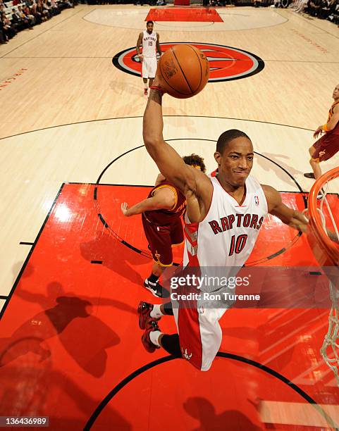 DeMar DeRozan of the Toronto Raptors goes to the basket during the game between Cleveland Cavaliers and the Toronto Raptors on January 4, 2012 at the...