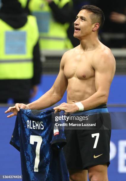 Alexis Sanchez of Inter Milan celebrates after scoring their side's second goal during the italian SuperCup match between FC Internazionale and...