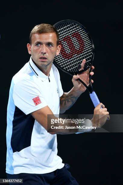 Daniel Evans of Great Britain hits a backhand in his match against Maxime Cressey of the USA during day five of the Sydney Tennis Classic at the...