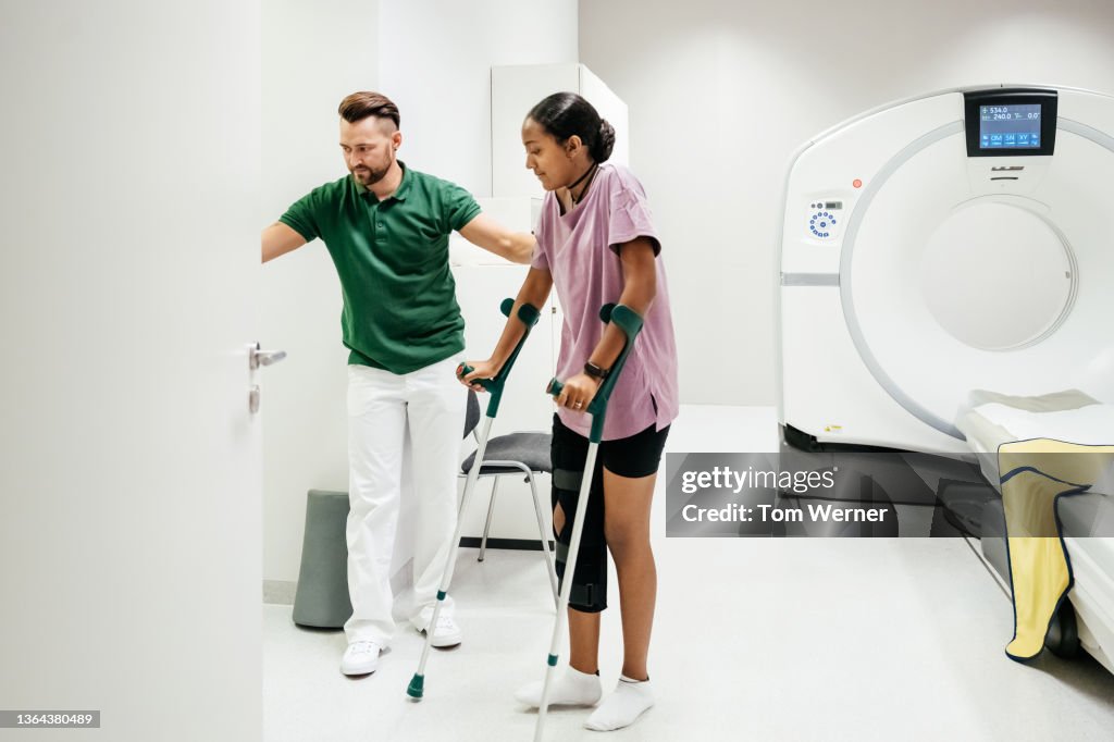 Injured Patient Leaving Hospital Room After CT Scan