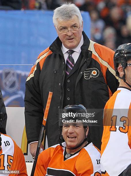 Pat Quinn of the Philadelphia Flyers looks on against the New York Rangers during the 2012 Bridgestone NHL Winter Classic Alumni Game on December 31,...