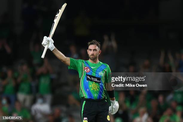 Glenn Maxwell of the Stars raises his bat after scoring a half century during the Men's Big Bash League match between the Melbourne Renegades and the...