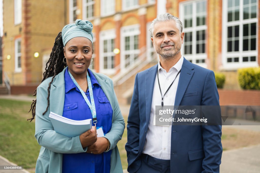 Outdoor portrait of education professionals on campus