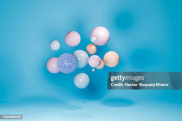 computer generated image of spheres with pastel tone and a sphere of blue hairs, 3d concept molecules - pastel hair stock-fotos und bilder