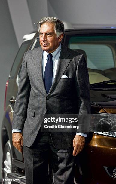 Ratan Tata, chairman of Tata Motors Ltd., pauses during the launch of the Tata Safari Storm sports utility vehicle at the Auto Expo 2012 in New...