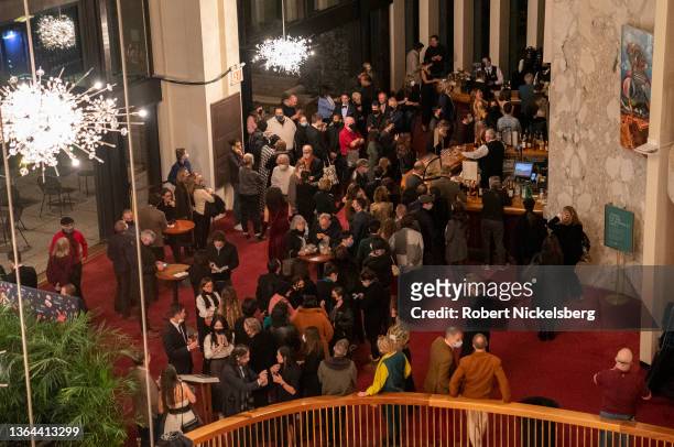 Opera goers have a drink during an intermission of the performance of Mozart's "The Marriage of Figaro" January 12, 2022 at the Metropolitan Opera at...