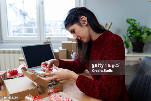 young woman   with  disability . online business owner - hearing loss at work stock pictures, royalty-free photos & images