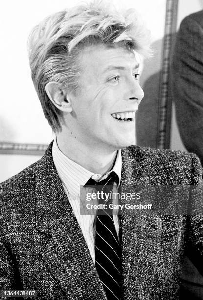 View of British Rock musician David Bowie during a press conference at the Carlyle Hotel, New York, New York, January 27, 1983. He was there to sign...