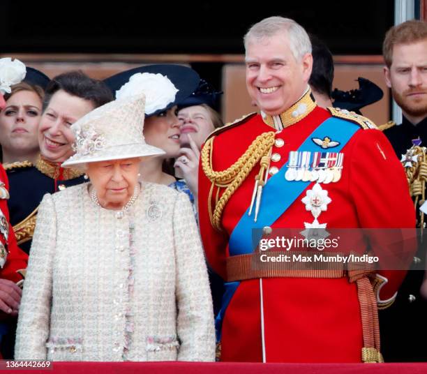 Queen Elizabeth II and Prince Andrew, Duke of York watch a flypast from the balcony of Buckingham Palace during Trooping The Colour, the Queen's...