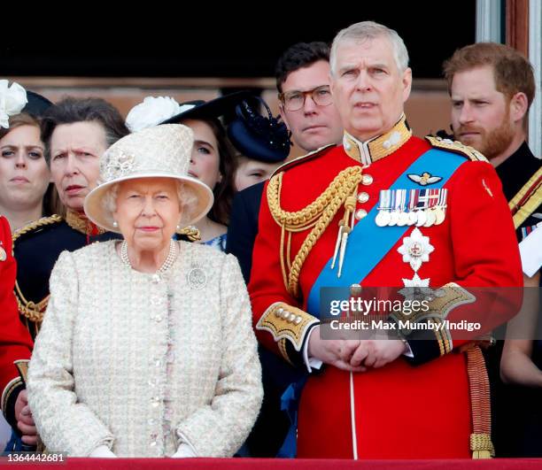 Queen Elizabeth II and Prince Andrew, Duke of York watch a flypast from the balcony of Buckingham Palace during Trooping The Colour, the Queen's...