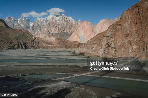 suspension bridge in gilgit-baltistan, pakistan - pakistani flag stock pictures, royalty-free photos & images