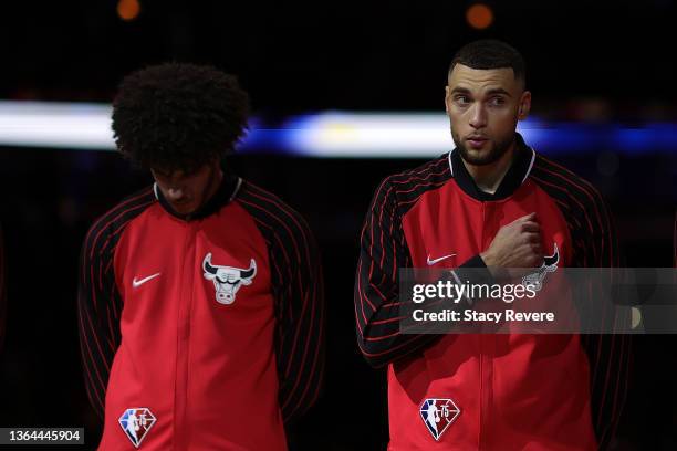 Lonzo Ball and Zach LaVine of the Chicago Bulls stand for the National Anthem prior to a game against the Brooklyn Nets at United Center on January...