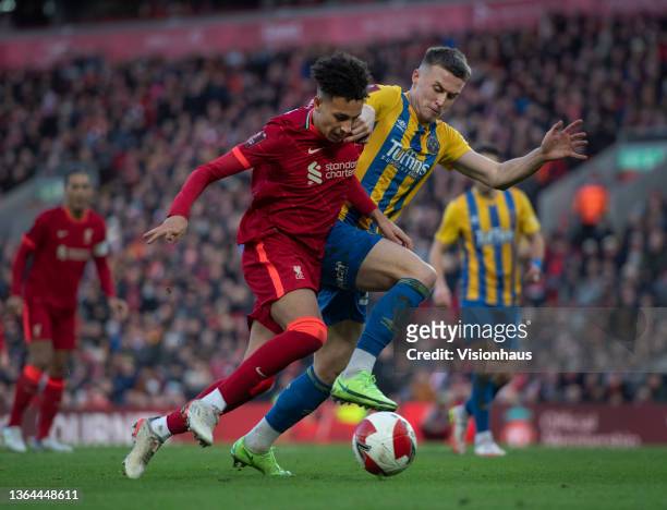 Kaide Gordon of Liverpool and George Nurse of Shrewsbury Town in action during the Emirates FA Cup Third Round match between Liverpool and Shrewsbury...