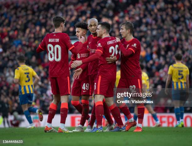 Fabinho of Liverpool celebrates scoing their team's second goal with team mates Kaide Gordon, Andrew Robertson, Max Woltman and Tyler Morton during...