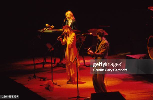 Pop & Rock musicians Christine McVie , on keyboards, vocalist Stevie Nicks , and Lindsey Buckingham, on guitar, all of the group Fleetwood Mac,...
