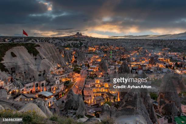 famous goreme town at night in cappadocia region in nevsehir province of turkey - nevşehir province stock-fotos und bilder