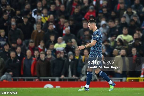 Granit Xhaka of Arsenal leaves the field of play after being sent off during the Carabao Cup Semi Final First Leg match between Liverpool and Arsenal...