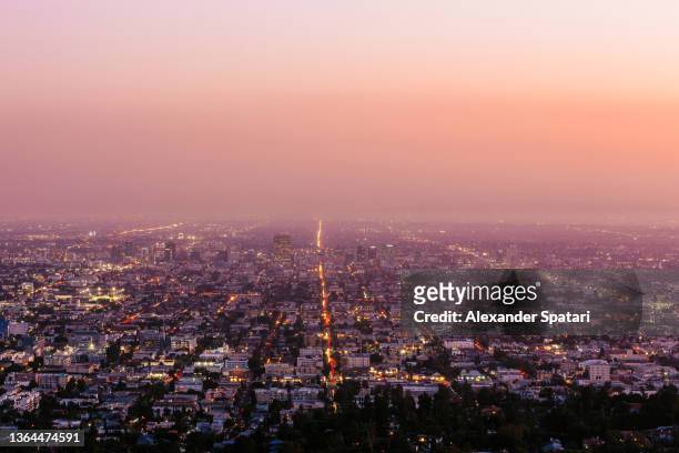 aerial view of los angeles skyline at sunset, california, usa - hollywood california imagens e fotografias de stock
