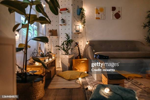 living room with projector screen and cushions - cozy stock pictures, royalty-free photos & images