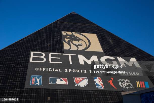 Thousands of NFL Sunday Night Football fans attending the Las Vegas Raiders vs Los Angeles Chargers walk across an Interstate 15 overpass where where...