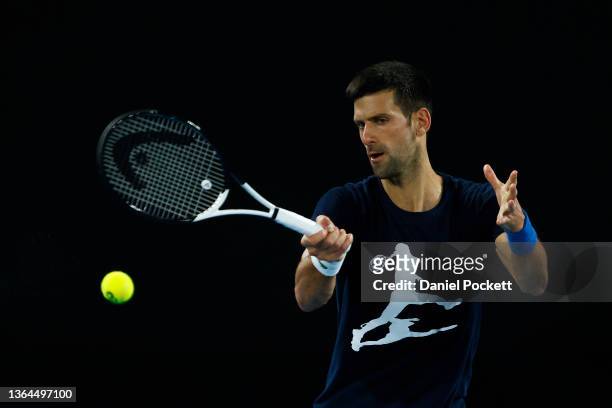 Novak Djokovic of Serbia plays a forehand during a practice session ahead of the 2022 Australian Open at Melbourne Park on January 14, 2022 in...