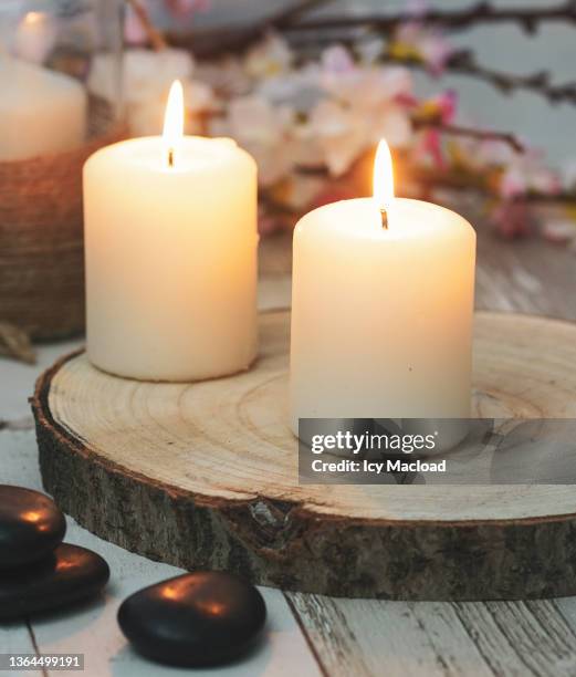 zen and romantic atmosphere for a moment of relaxation, taking care of yourself, alone or as a couple - candles stock pictures, royalty-free photos & images