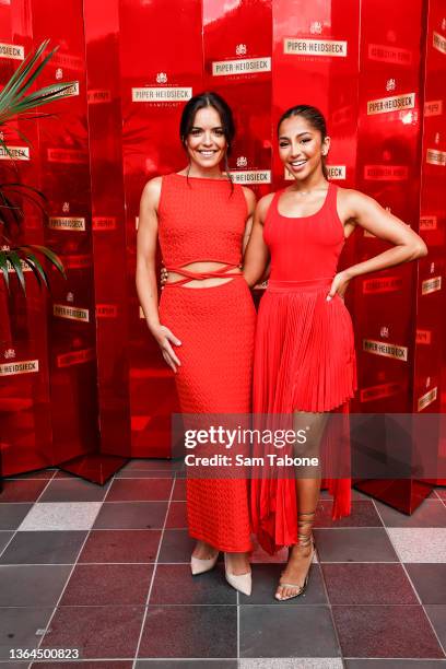 Olympia Valance and Maria Thattil attend the launch of the Piper-Heidsieck Champagne Bar ahead of the Australian Open on January 14, 2022 in...