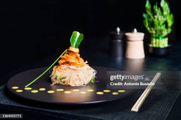 rise noodle with calamari - haute cuisine stock pictures, royalty-free photos & images