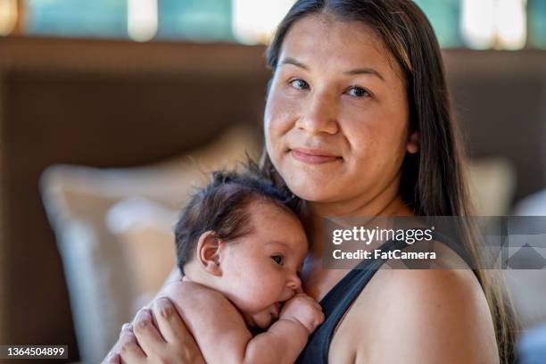 mother and baby portrait - indigenous canada stock pictures, royalty-free photos & images