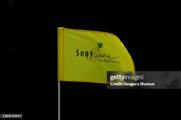 Pin flag blows in the breeze on the first green during the first round of the Sony Open in Hawaii at Waialae Country Club on January 13, 2022 in...