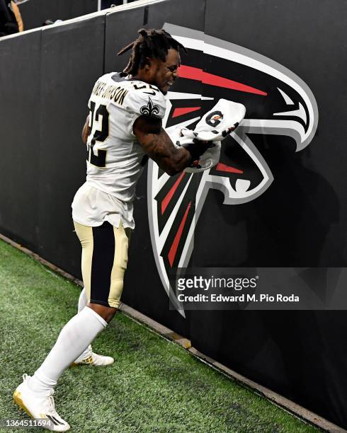 Gardner-Johnson of the New Orleans Saints punches the Atlanta Falcons logo after a game at Mercedes-Benz Stadium on January 9, 2022 in Atlanta,...