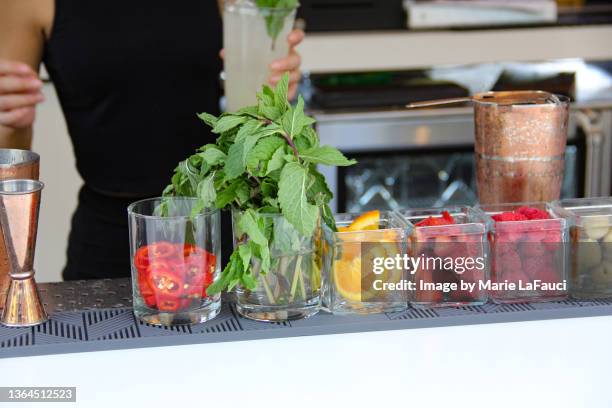 outdoor bartender station - woman looking through ice stock pictures, royalty-free photos & images