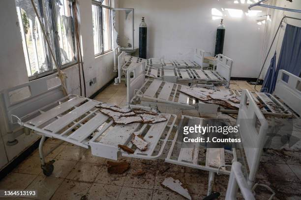 Bed frames damaged by artillery fire sit in a room at the Haik Health Center on January 12, 2022 in the Haik, Ethiopia. When the TPLF occupied the...