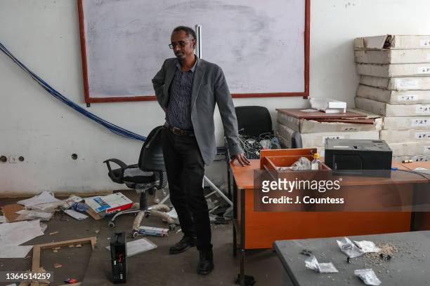 President of Wollo University Dr. Mengesha Ayene surveys what remains of a computer lab at Wollo University on January 11, 2022 in Dessie, Ethiopia....