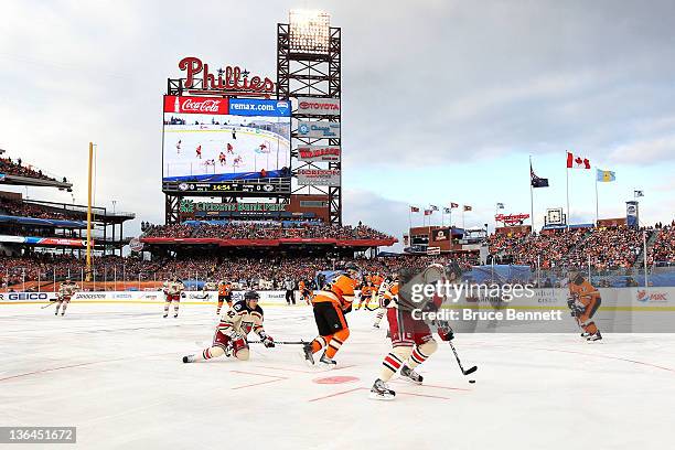 The Philadelphia Flyers take on the New York Rangers during the 2012 Bridgestone NHL Winter Classic at Citizens Bank Park on January 2, 2012 in...