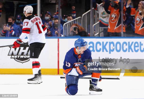 Mathew Barzal of the New York Islanders scores the game winning goal at 15:07 of the third period against the New Jersey Devils at the UBS Arena on...