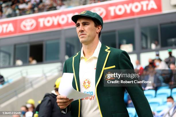 Pat Cummins of Australia walks out for the coin toss during day one of the Fifth Test in the Ashes series between Australia and England at Blundstone...