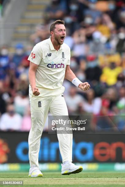 Ollie Robinson of England celebrates the wicket of Steven Smith of Australia during day one of the Fifth Test in the Ashes series between Australia...