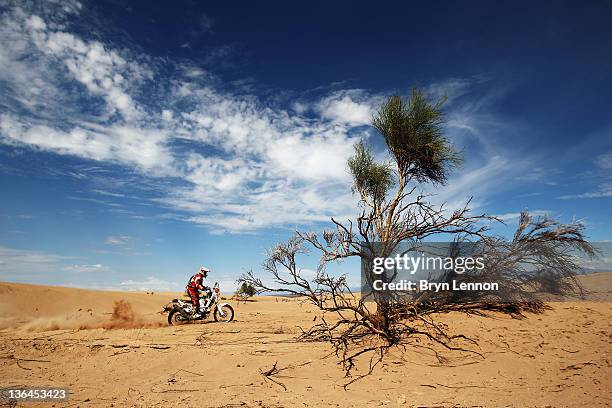 Franco Picco of Italy and Franco Picco Racing rides through the sand dunes during stage five of the 2012 Dakar Rally from Chilechito to Fiambala on...