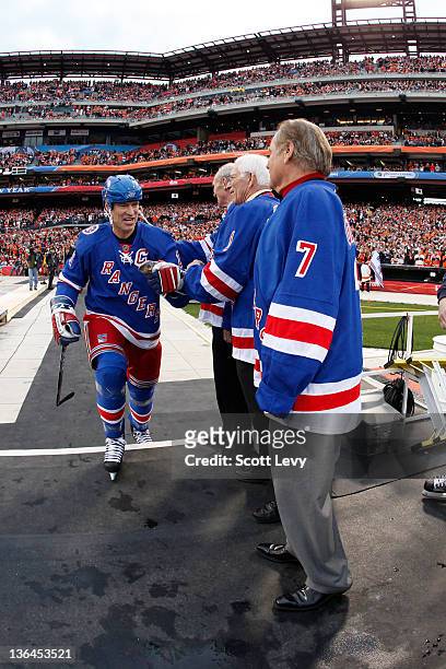 New York Rangers Mark Messier and ambassadors Harry Howell, Ed Giacomin and Rod Gilbert and prior to the game against the Philadelphia Flyers at...