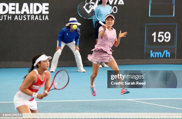 Makoto Ninomiya of Japan in action with partner Erin Hozumi of Japan in their finals match against Tereza Martincova of Czechoslovakia and Marketa...