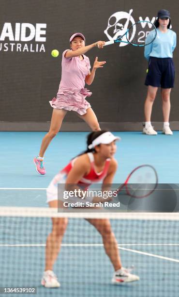 Makoto Ninomiya of Japan in action with partner Erin Hozumi of Japan in their finals match against Tereza Martincova of Czechoslovakia and Marketa...