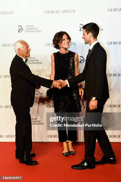 Giorgio Armani, Roberta Armani and Novak Djokovic attend the Milan Gala Dinner benefitting the Novak Djokovic Foundation presented by Giorgio Armani...