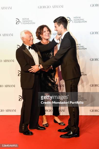 Giorgio Armani, Roberta Armani and Novak Djokovic attend the Milan Gala Dinner benefitting the Novak Djokovic Foundation presented by Giorgio Armani...