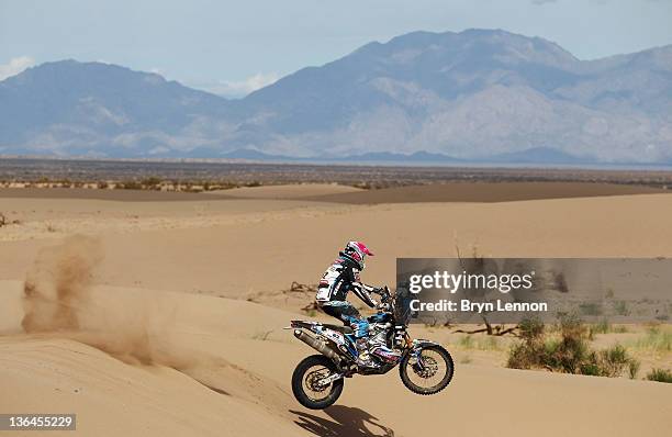 Vincent Guindani of France and Team Vizion Racing in action jumps a sand dune stage five of the 2012 Dakar Rally from Chilechito to Fiambala on...