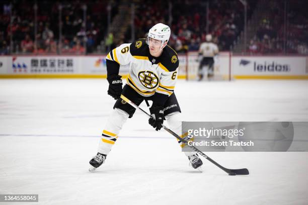 Mike Reilly of the Boston Bruins handles the puck against the Washington Capitals during the first period of the game at Capital One Arena on January...