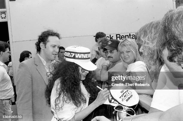 Ronnie Spector of The Ronettes signing autographs for fans after her performance in Asbury Park, New Jersey on May 22, 1987. Her manager Jonathan...