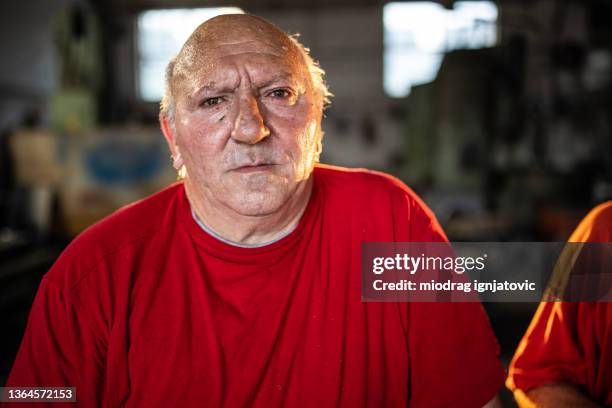 serious caucasian man frowning - obese man stock pictures, royalty-free photos & images