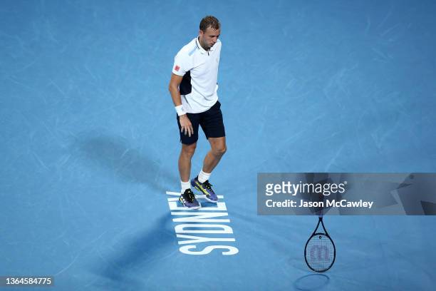 Daniel Evans of Great Britain shows his frustration in his semi final match against Aslan Karatsev of Russia during day six of the Sydney Tennis...